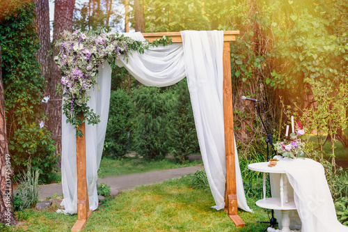 wedding arch in the style of rustic pine summer park
