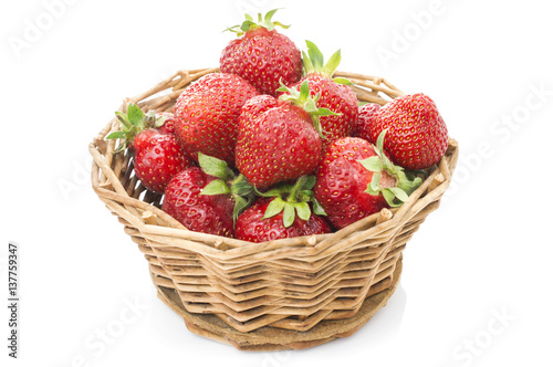 Red fresh strawberry in a bowl on white background