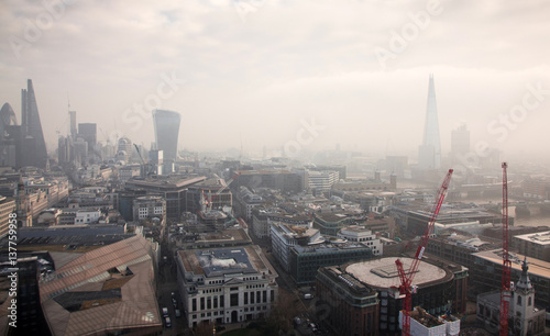 rooftop view over London on a foggy day from St Paul s cathedral  UK