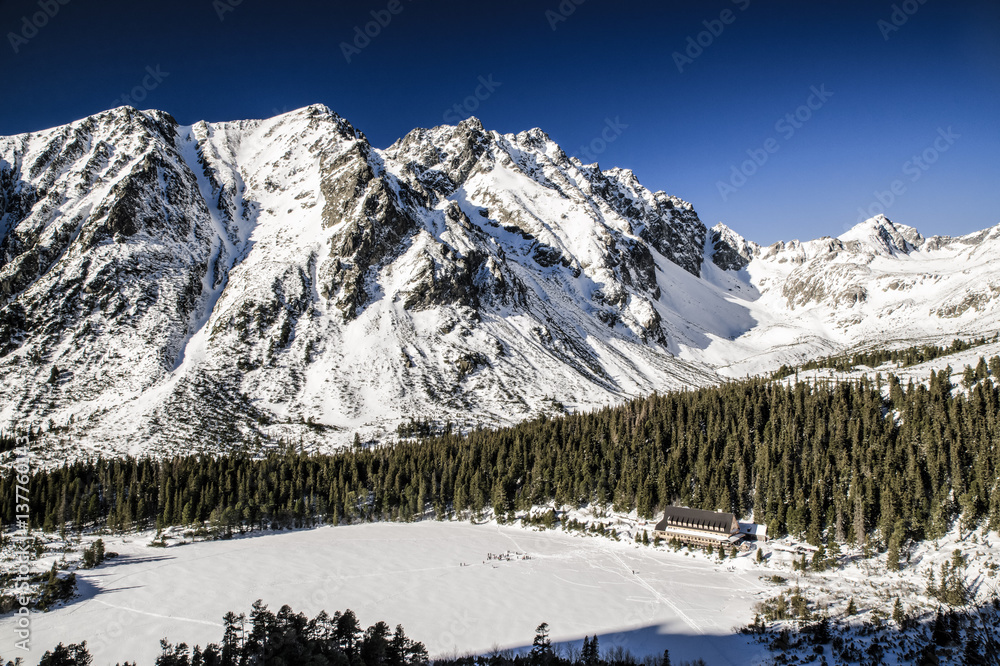 Frozen lake Popradske pleso in High Tatras, Slovakia