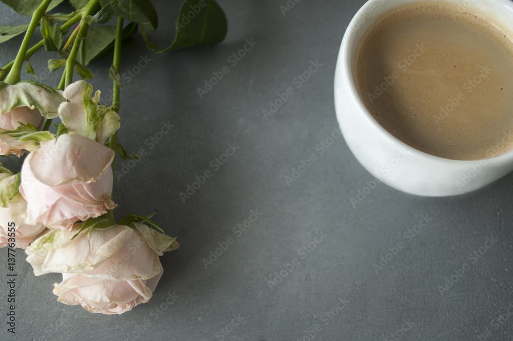 Light pink chineese rose with coffe cup on concrete background Light pink chineese rose with coffe cup on concrete background