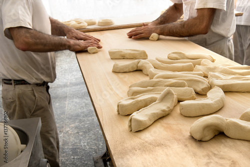 Male bakers making bread