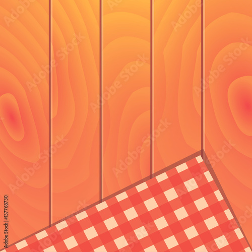 Wooden background with plaid tablecloth