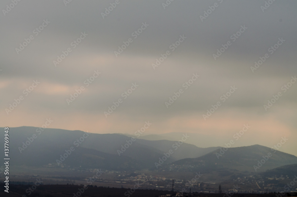 overcast sky in the misty mountains