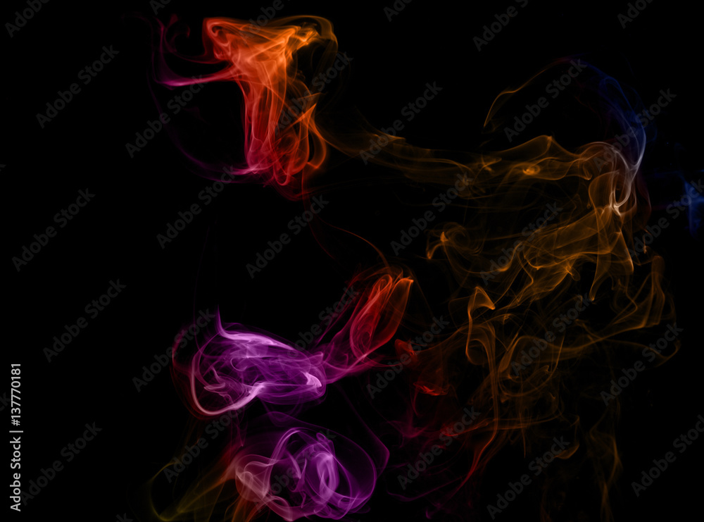 Colored smoke on a black background. Abstract flower Colored smoke on a black background. Abstract flower