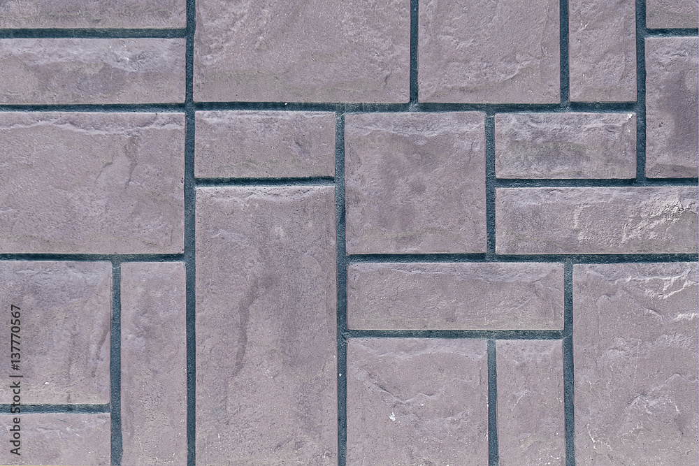 Obraz premium wall background of gray rectangular stones closeup