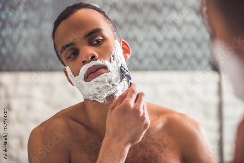Afro American man in bathroom