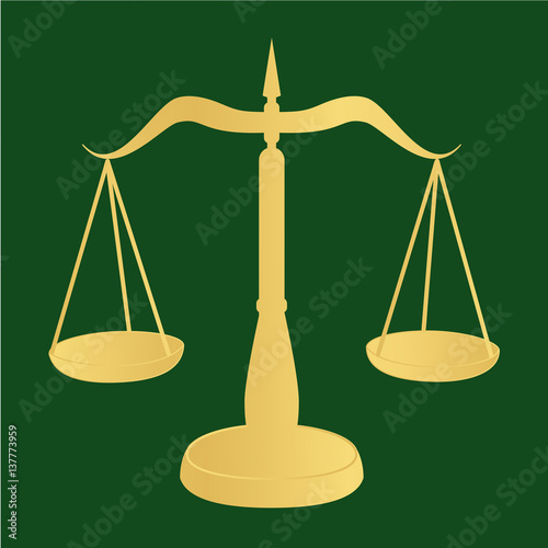 Scales on a green background