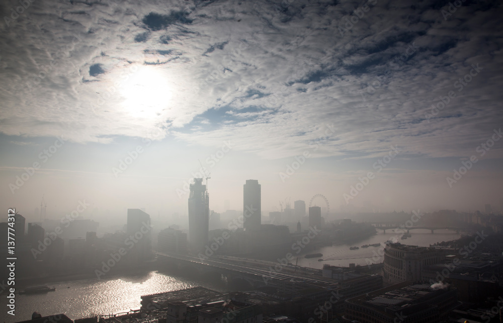 Naklejka premium rooftop view over London on a foggy day from St Paul's cathedral, UK