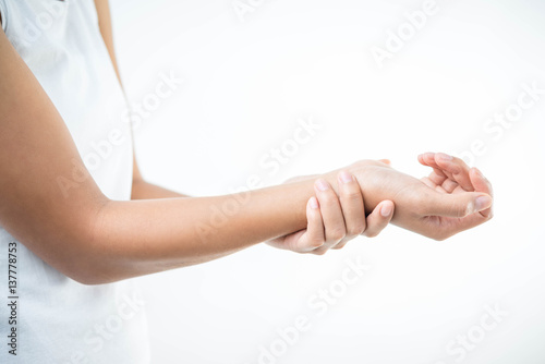 Pain in the joints of the hands. Carpal tunnel syndrome. Isolated on white background,health care concept.