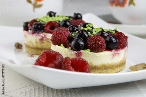 mini cheesecakes with mixed berries