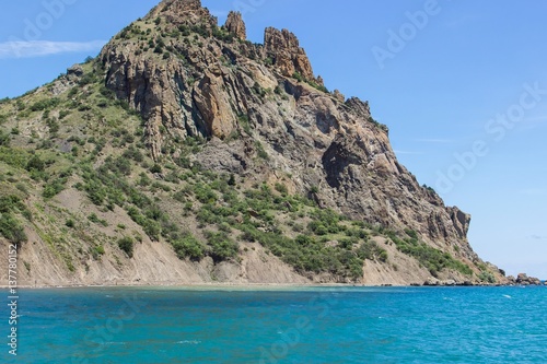 Rocky coastline of south Crimea. View from the sea © azamotkin