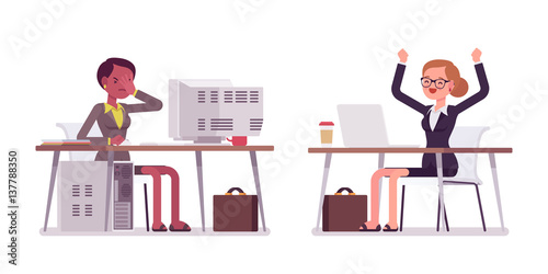 Young businesswomen working at old and modern computer