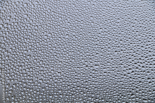 Spring. Raindrops on a sweaty glass.