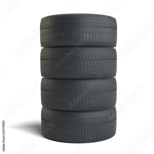 Stack of four black tires © cherezoff