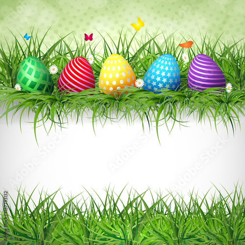 Golden Easter eggs on the grass