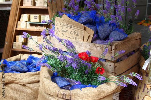 Bags of lavender seeds decorated with lavender flowers at market in Menton, town in South France, French riviera