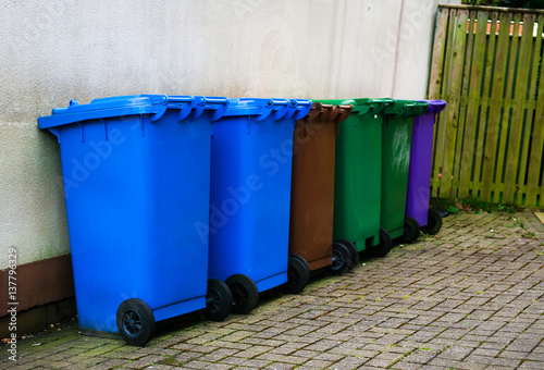 bright colored dustbins on the streets of Scotland photo