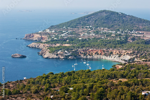 Aerial view of Ibiza. Beautiful turquoise bay at Ibiza. Luxury rest at Balearic Islands.