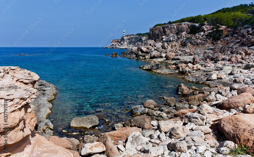 Wild stone beach at Ibiza north.