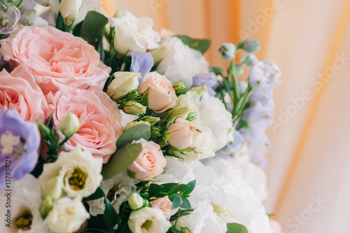 Wedding decor. Beautiful flowers in bouquet, closeup