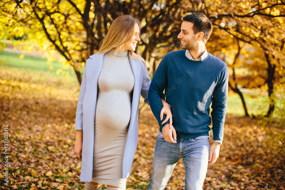Happy couple in the autumn park Happy couple in the autumn park