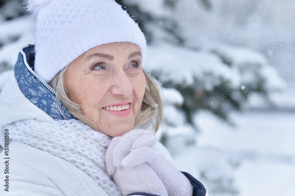 Senior woman in frosty winter Senior woman in frosty winter