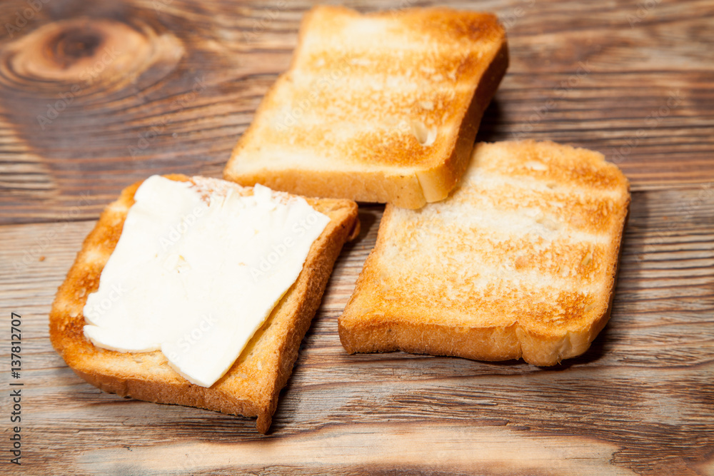 Breakfast, toast and coffee on a wooden background Breakfast, toast and coffee on a wooden background