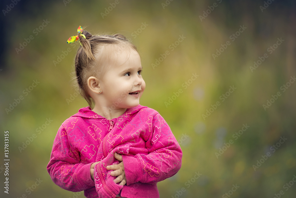 Children in the village walk in the tall grass Children in the village walk in the tall grass