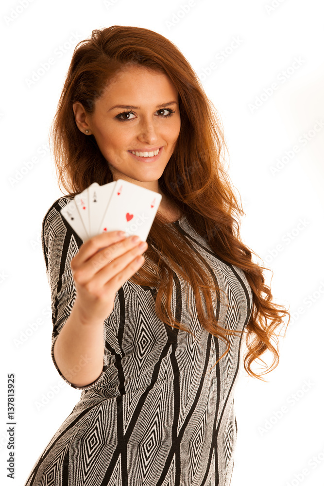 Beautiful brunette holding four aces as a sign for poker game, gambling and casino Beautiful brunette holding four aces as a sign for poker game, gambling and casino