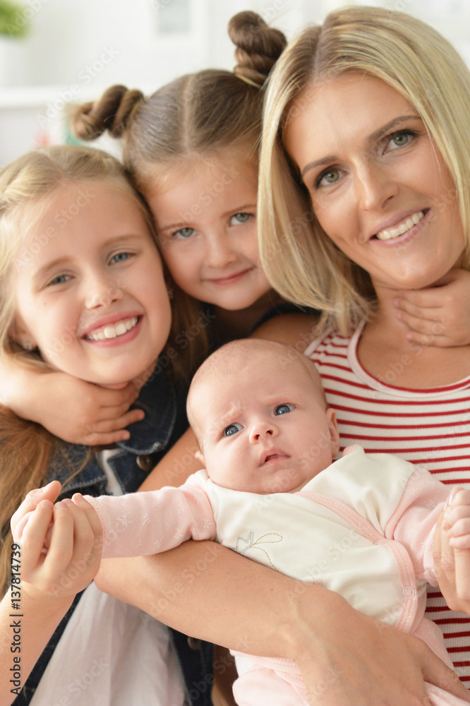 mother with little daughters