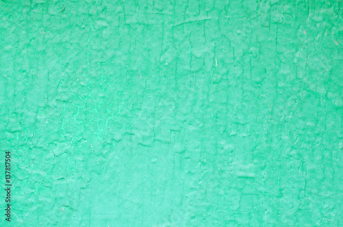 green background with cracked paint dry