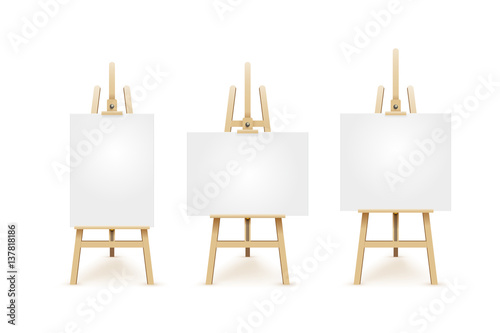 Set of wooden brown easels with mock up empty blank square canvases. Isolated white on background. Vector illustration EPS 10.