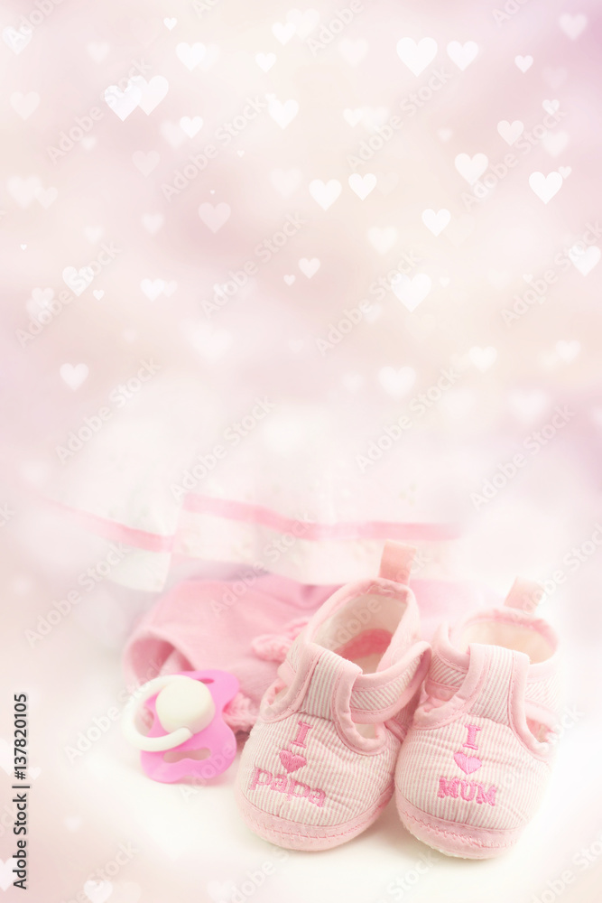 cute Baby pink clothes for newborn on abstract light background ...