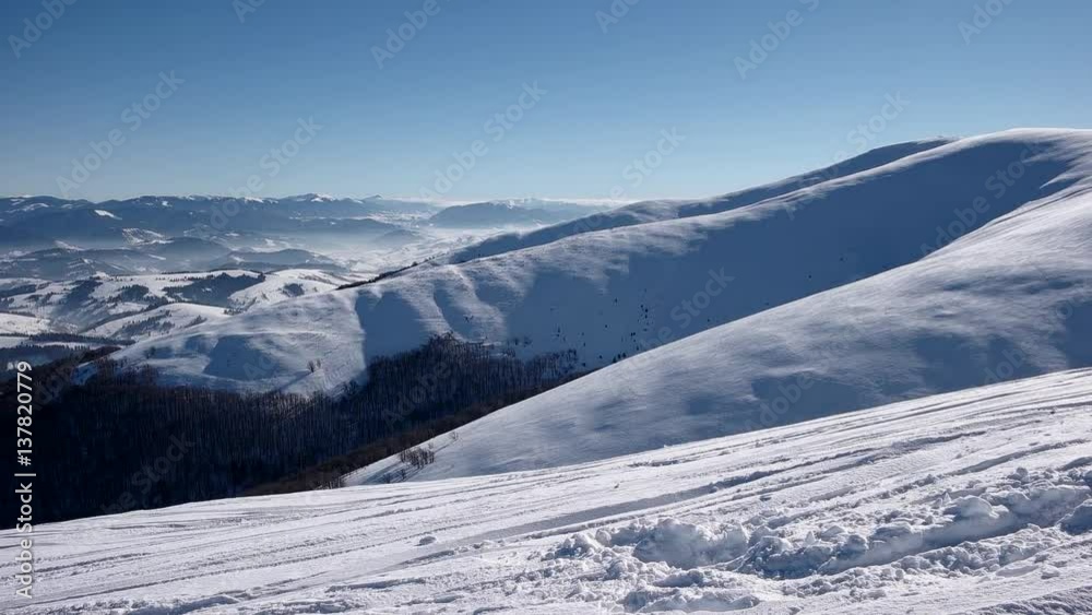 Mountain Ridge and Snow Covered Mountains and Rural Landscape in Winter Sunny Day Panning View Mountain Ridge and Snow Covered Mountains and Rural Landscape in Winter Sunny Day Panning View