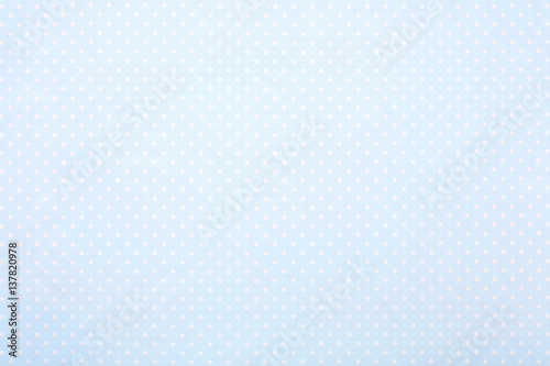Pastel blue polka dot fabric background for baby