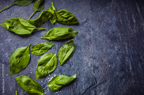 basil leaves on food background