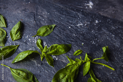 basil leaves on food background