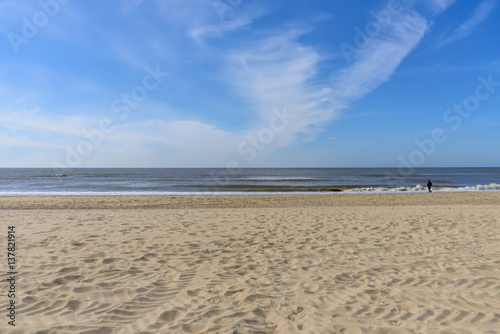 Seascape horizon line Sandy Beach Netherlands. Heavenly expanse