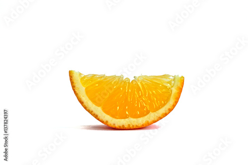 Closeup of an orange wedge on a white background