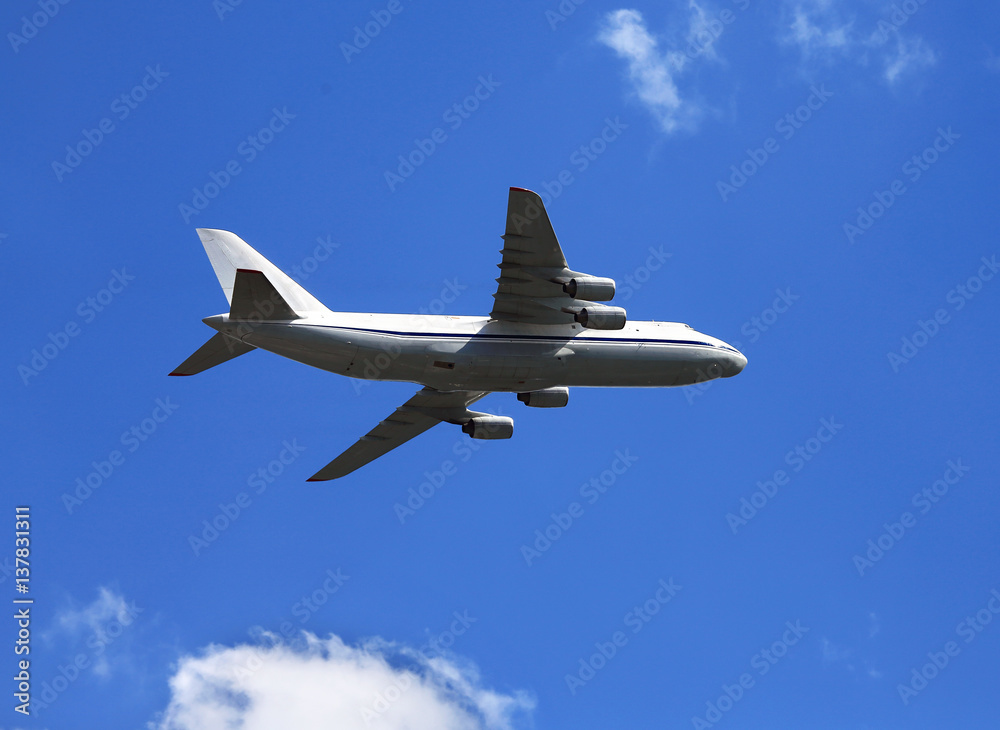 Large jet if flight in cloudy sky
