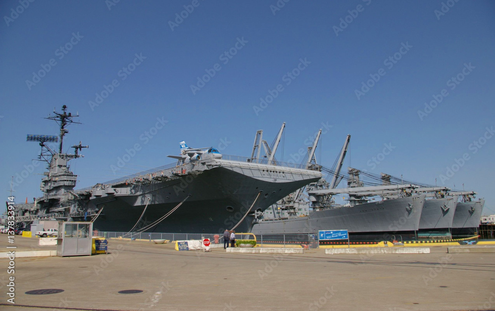 ALAMEDA, USA - MARCH 23, 2010: Museum aircraft carrier Hornet anchored in Alameda, USA on March 23, 2010. ALAMEDA, USA - MARCH 23, 2010: Museum aircraft carrier Hornet anchored in Alameda, USA on March 23, 2010.