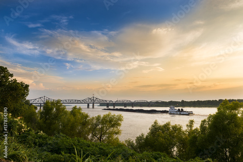 A pusher boat in the Mississippi River near the Vicksburg Bridge in Vicksburg, Mississippi, USA. photo
