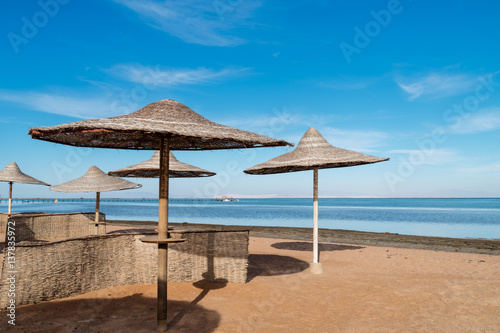Fototapeta Naklejka Na Ścianę i Meble -  Umbrellas on the beach, Sharm El Sheikh, Nabq bay, Egypt