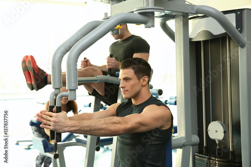 Young man training in moder...