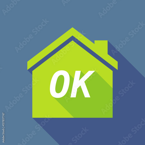 Long shadow house with    the text OK