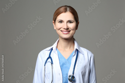 Beautiful young doctor with...