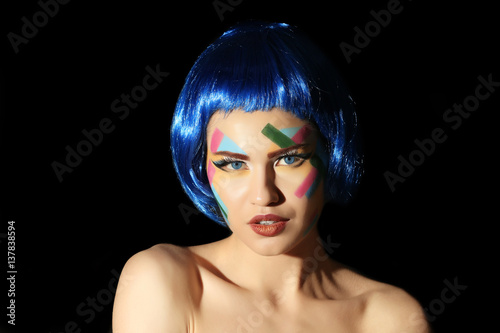 Portrait of young woman wit...