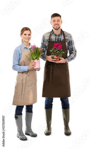 Two florists holding house ...