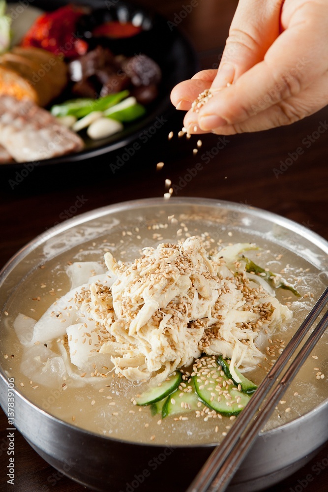 Chogye guksu. cold chicken noodles. It's a asia style cuisine. Chogye guksu. cold chicken noodles. It's a asia style cuisine.